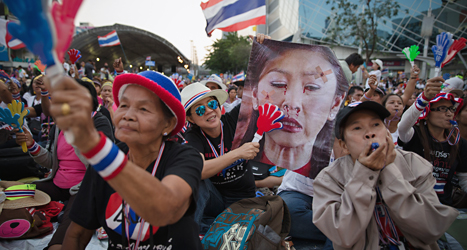 Demonstranterna i Bangkok vill tvinga regeringen att sluta.
Foto:John Minchillo/TT.